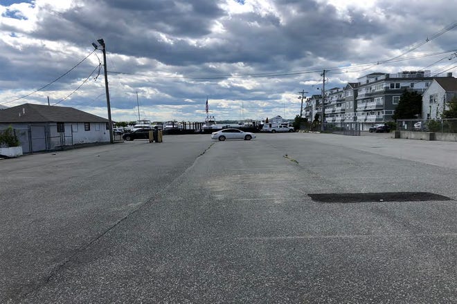 The Manchester Hotel is expected to be built in a vacant parking lot on Lee's Wharf in Newport.