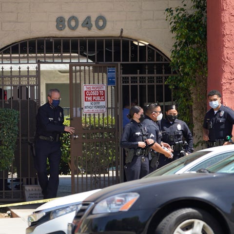 Los Angeles Police Chief Michel Moore exits an apa