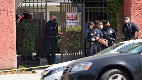 Los Angeles Police Chief Michel Moore exits an apa