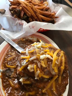 Plates of food at Ron's Hamburgers and Chili. File photo