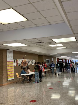 Students file through the halls at Petersburg High School on April 12, 2021. This was the first day students entered the school since closing for the COVID-19 pandemic.