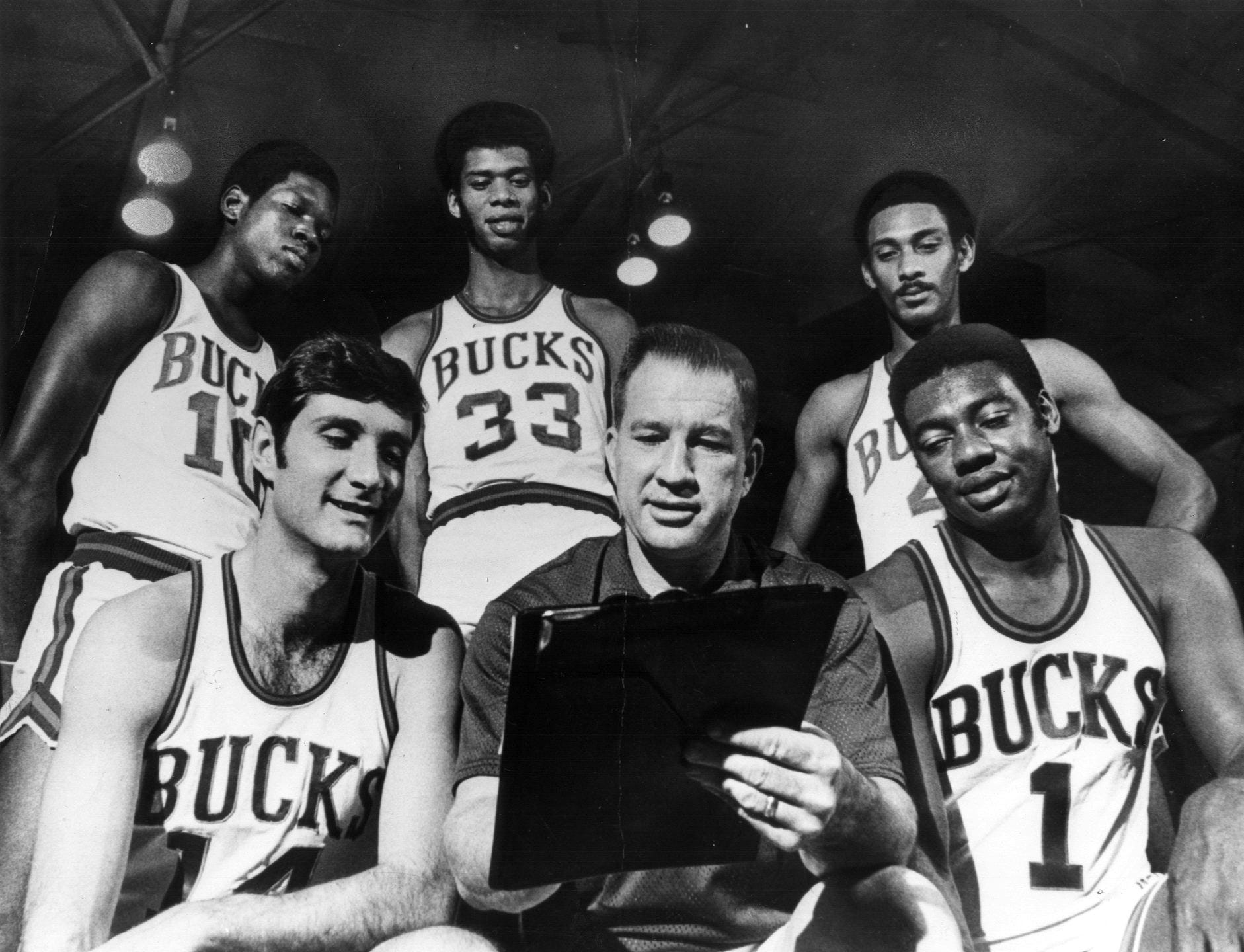 Larry Costello designing a play for Bob Dandridge, Kareem Abdul-Jabbar, Greg Smith, Jon McGlocklin and Oscar Robertson