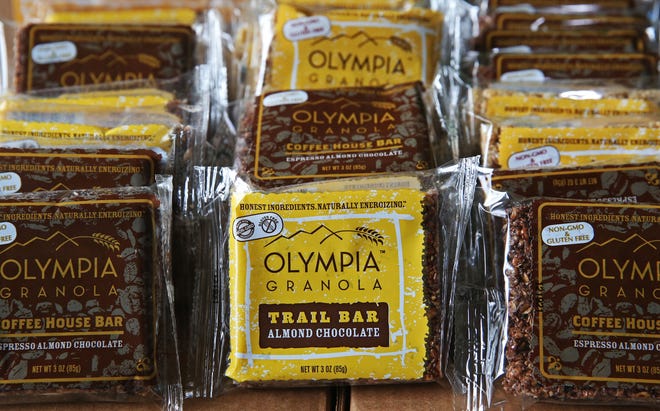 Olympia Granola Bars from owners AJ Girard and Dana Herdeman are shown.