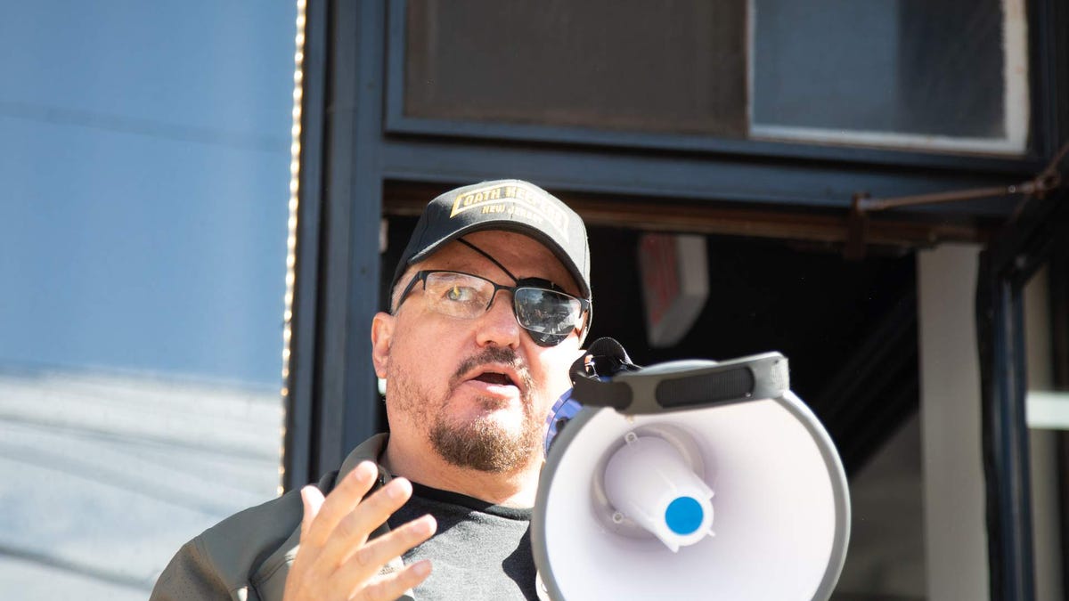 Oath Keeper President Stewart Rhodes, left, is tattooed by Roberto Minuta tattoo at his shop,  Casa di Dolore, in Newburgh on Saturday, May 30, 2020.