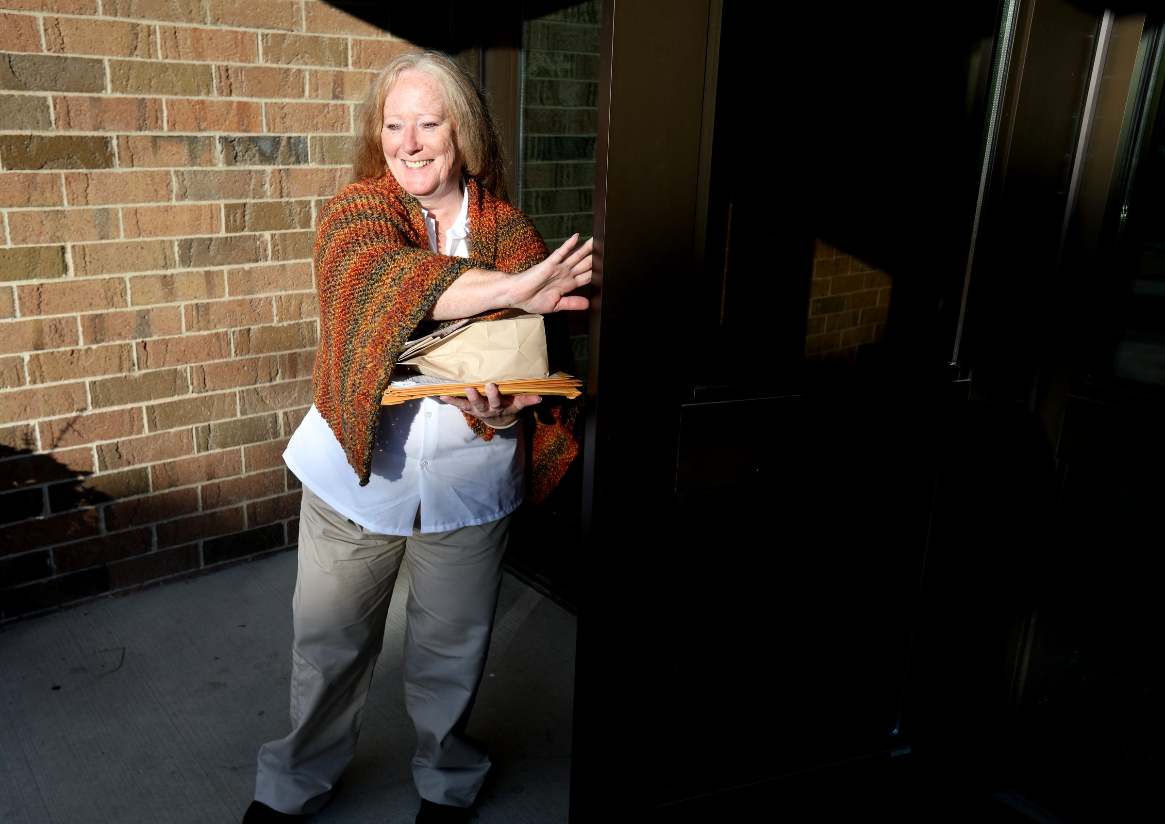 Edith Turner walks out of the Women's Huron Valley Correctional Facility in Ypsilanti on Tuesday, September 24, 2019, as a free woman after more than 10 years in prison.