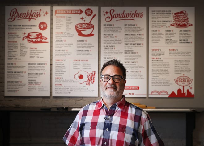 Owner Derk Meitzler of Backlot Sandwich Shop off Front Street downtown Tuesday, April 13, 2021.