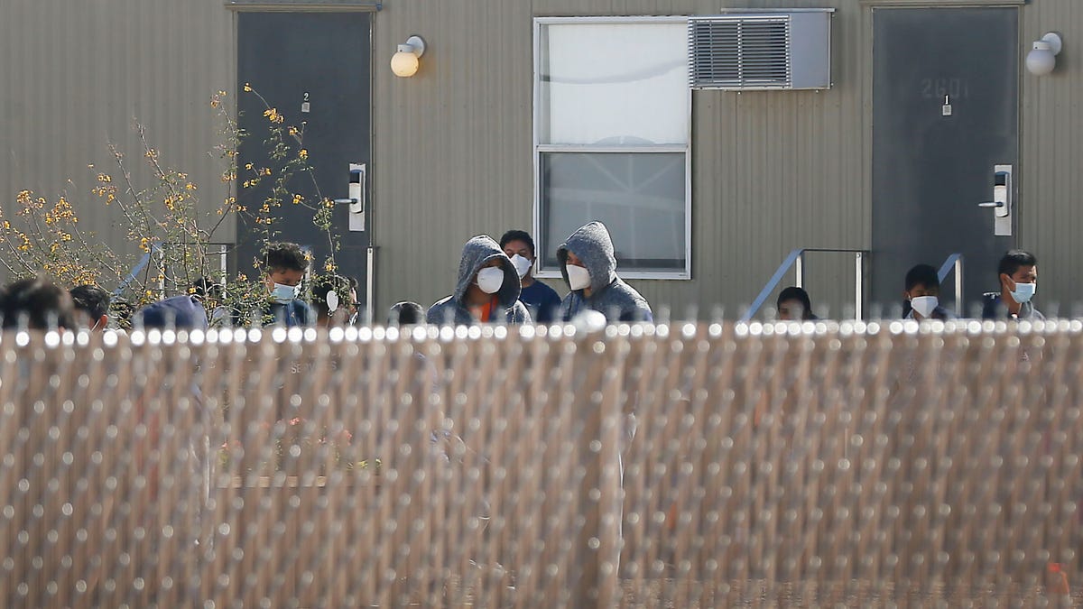 Migrant children at a shelter for unaccompanied minors Friday, April 9, 2021, in Pecos. The property is owned by Target Hospitality. It was formally being used by oil field workers for lodging while at a job worksite. It is now housing migrant children.