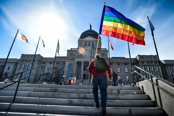 Demonstrators gather on the steps of the Montana State Capitol protesting proposed anti-transgender legislation.