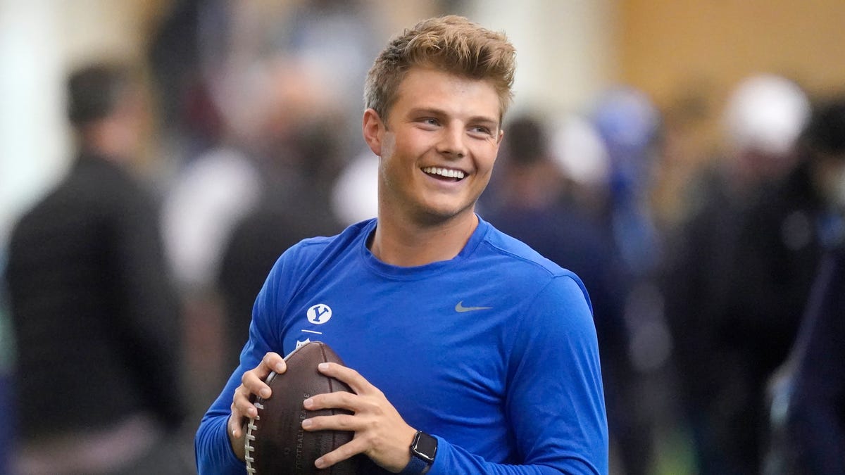BYU quarterback Zach Wilson warms up before participating in the school's pro day football workout for NFL scouts Friday, March 26, 2021, in Provo, Utah.