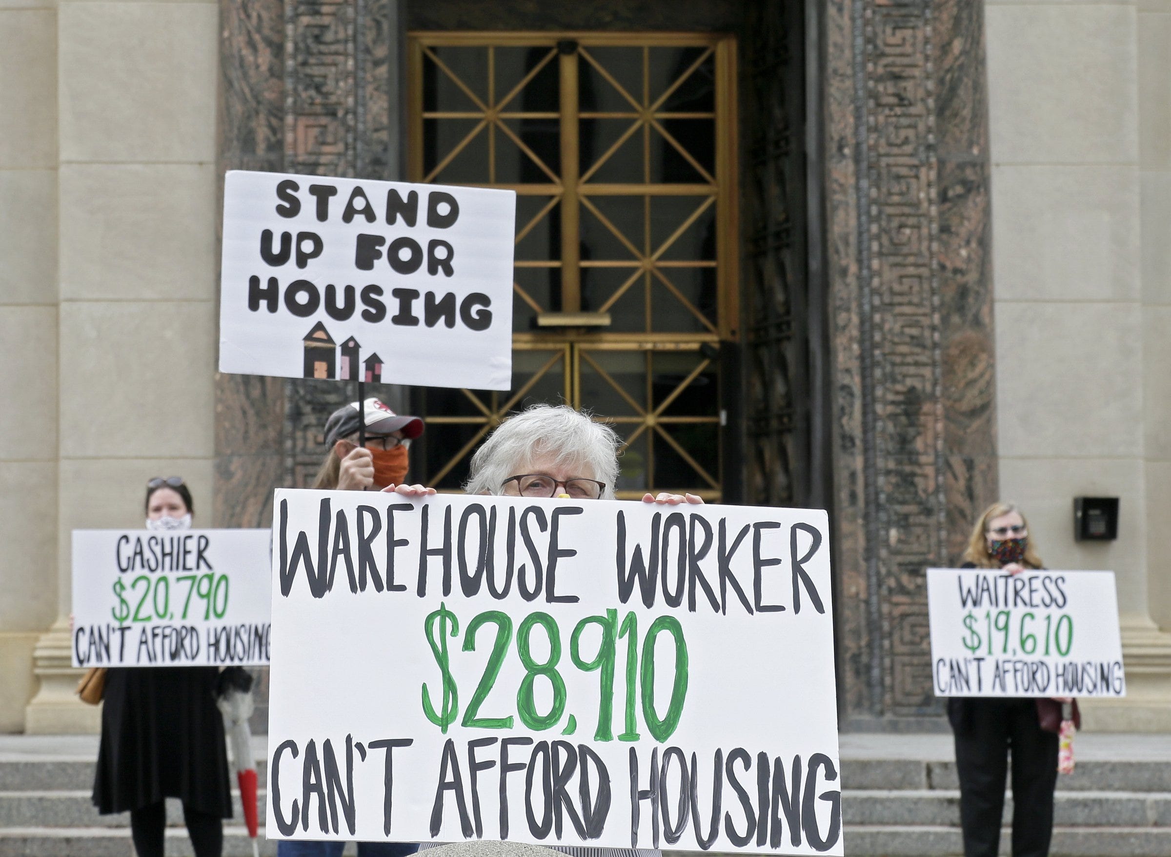 Advocates for low-wage workers demonstrated at City Hall in downtown Columbus on Thursday, May 28, 2020, calling for more affordable housing and assistance for those facing eviction due to the coronavirus pandemic. [Barbara J. Perenic/Dispatch] ORG XMIT: 159890 (Via OlyDrop)