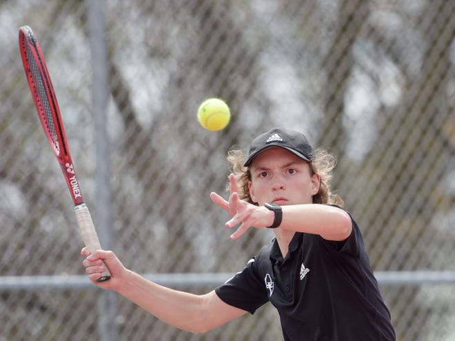 Quaker Valley's Will Sirianni competes in the WPIAL Class 2A tennis consolation match against Thomas Jefferson's Drew Dimidijan Wednesday afternoon at North Allegheny High School.