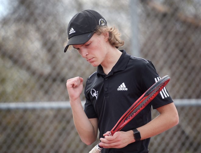 Quaker Valley's Will Sirianni reacts after scoring a point in the WPIAL Class 2A tennis consolation match against Thomas Jefferson's Drew Dimidjian Wednesday afternoon at North Allegheny High School.