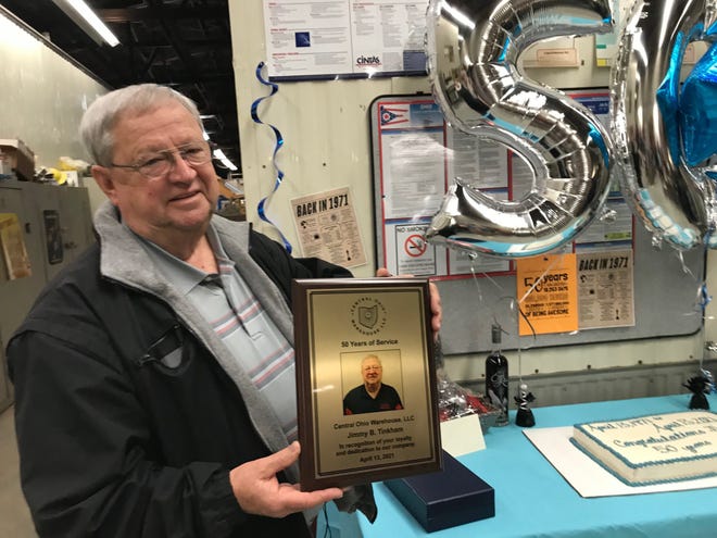 Jim Tinkham was surprised Wednesday with a 50th anniversary luncheon at Central Ohio Warehousing Park in Shelby. Tinkham started at the business on April 13, 1971. He has no plans to retire anytime soon.