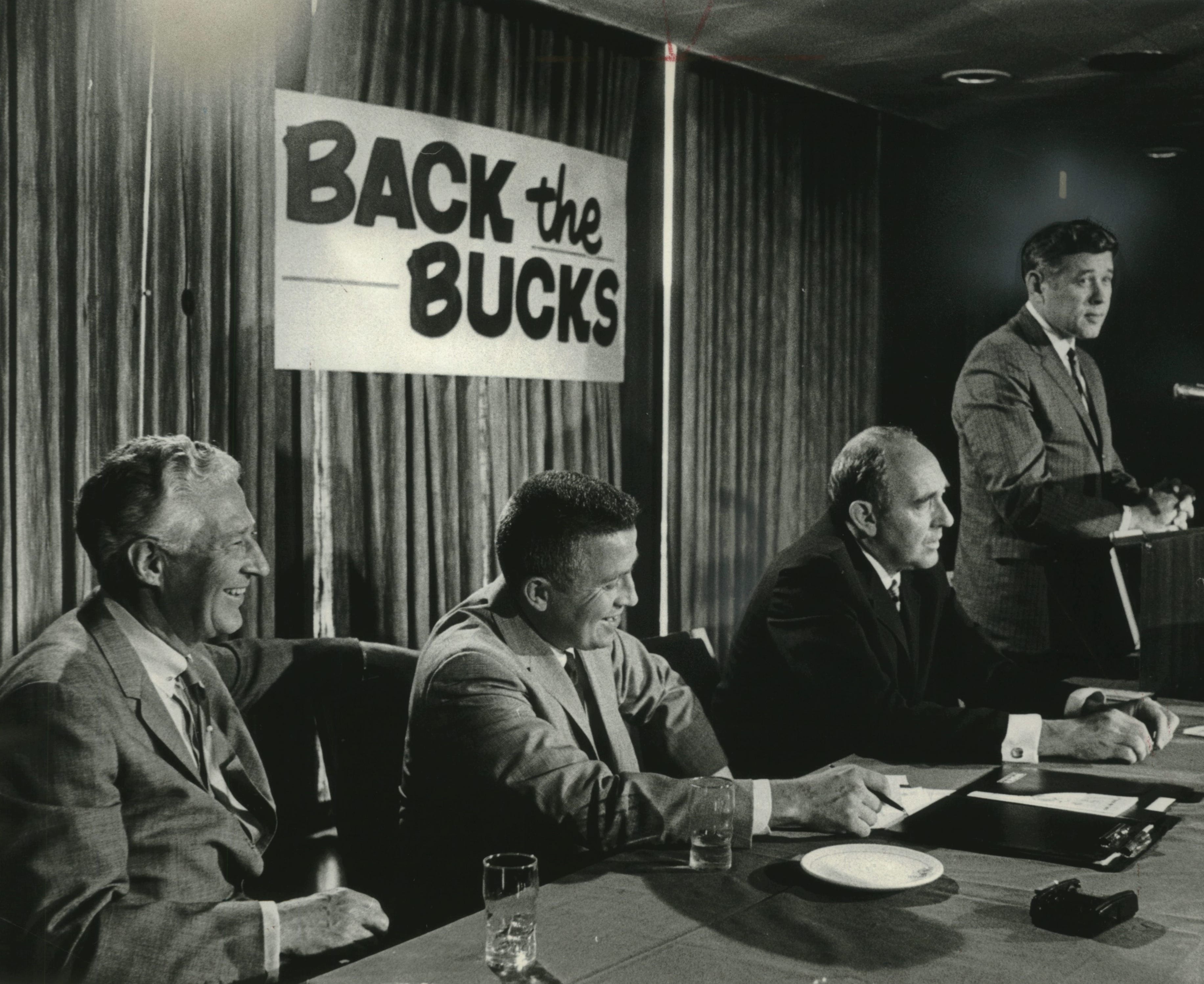 Milwaukee Mayor Henry Maier speaks as the Milwaukee Bucks open their season-ticket drive. Also at the table, from left, are Gov. Warren Knowles, Bucks general manager John Erickson and Bucks president Ray Patterson.