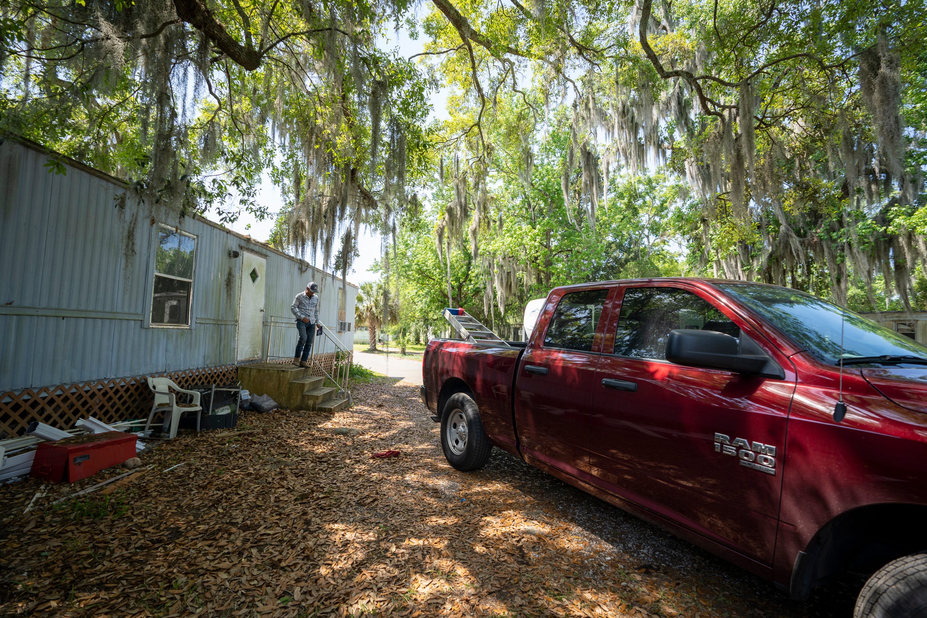 Francis Portillo earns about $4,000 a month, drives a 2020 Dodge Ram pickup and sends money to his relatives in Honduras.