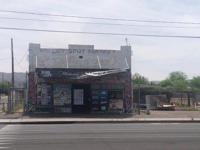 The former liquor store will be transformed into a coffee shop, communal kitchen and meeting room in the south of Phoenix.