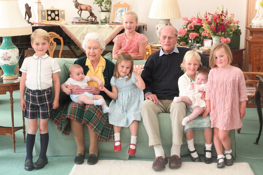 Queen Elizabeth II and Prince Philip pose with their great-grandchildren in 2018.
