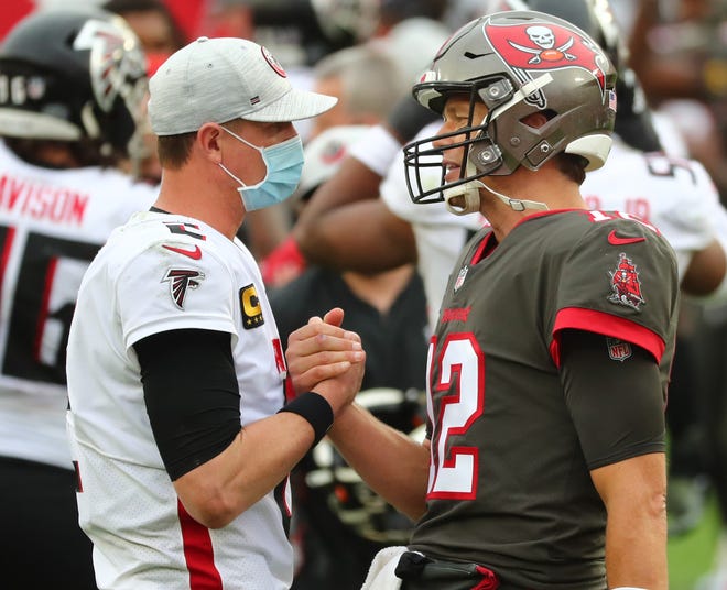 Buccaneers QB Tom Brady (12) and Atlanta's Matt Ryan play in the same division, but how many more head-to-head matchups are in their futures?
