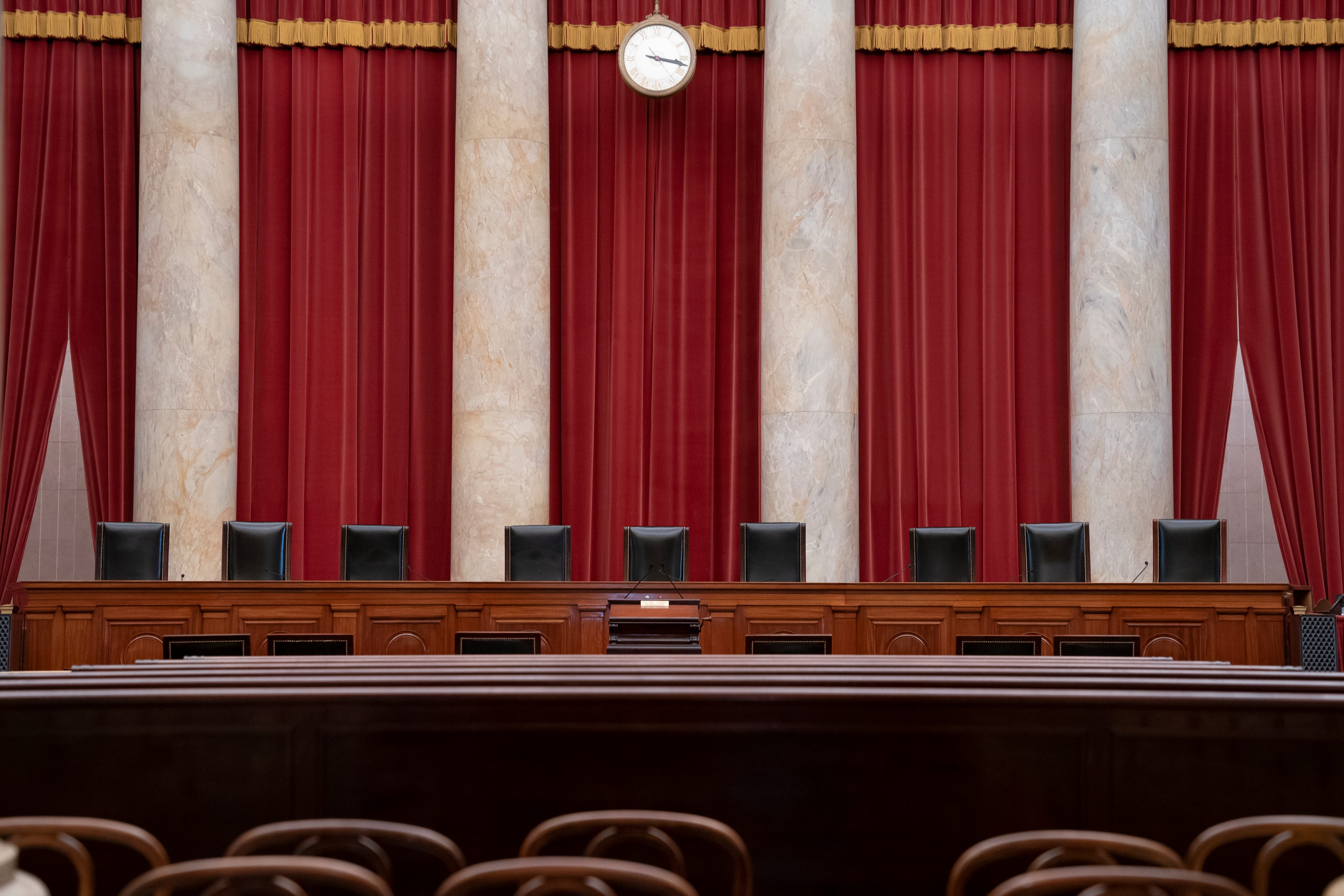 Some Democratic lawmakers have proposed adding four chairs to the nine justices’ seats on the Supreme Court bench.
