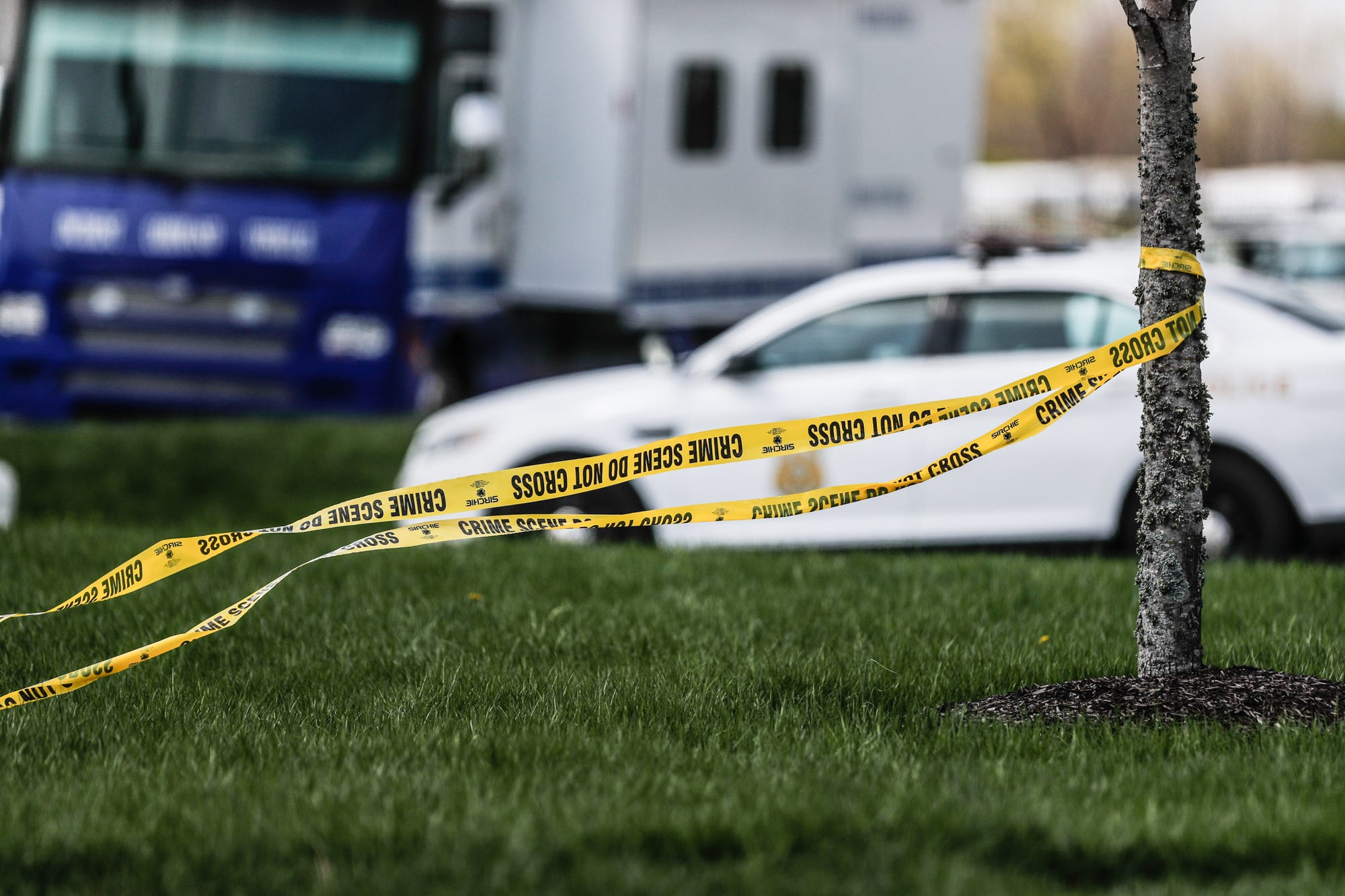 Investigators are on the scene following a mass shooting at a FedEx facility in Indianapolis, Friday, April 16, 2021. The shooting took place late Thursday evening at the FedEx Ground Facility near the Indianapolis International Airport. 