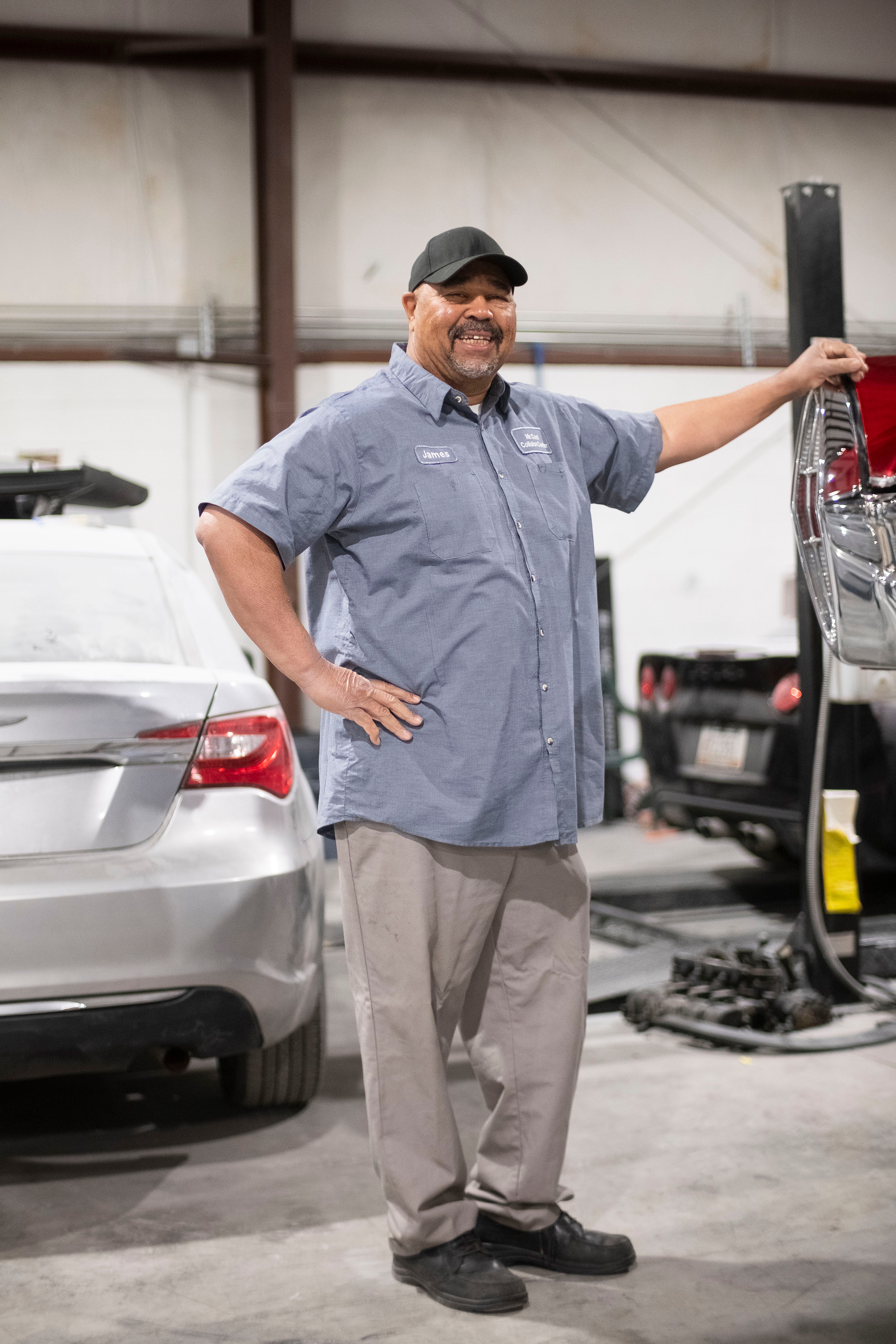 James Brown, aka Mr. Cool, poses for a portrait at the Mr. Cool Collision on Gleason Dr.  in Knoxville, Tennessee on Friday, April 16, 2021. Brown has been repairing cars for over 45 years, including 25 years here in Knoxville.  Its Kingston Pike location was one of the earliest black-owned companies in West Knoxville.