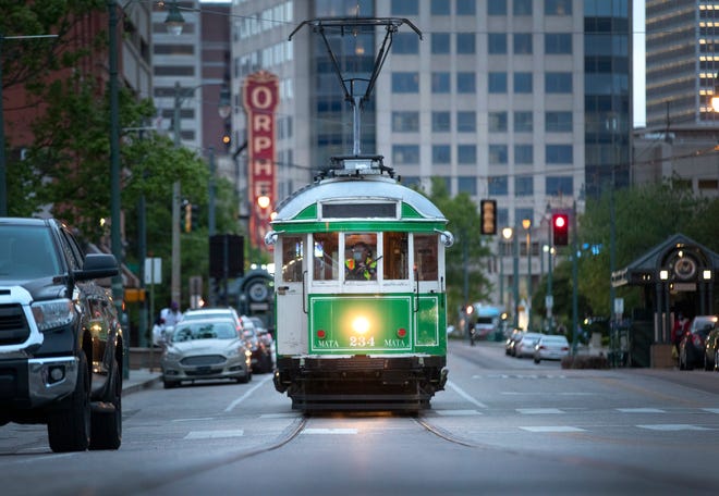 A trolly car makes its way down South Main Street in Downtown Memphis on Thursday, April 15, 2021. 