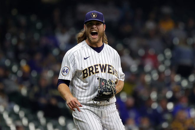Brewers fans got to toast Corbin Burnes' generosity while watching him pitch Wednesday night.