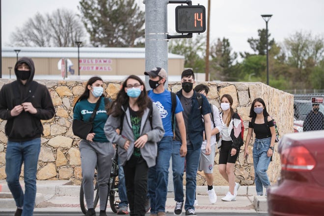 Las Cruces High School students walk off campus after school on Friday, April 16, 2021, in Las Cruces.