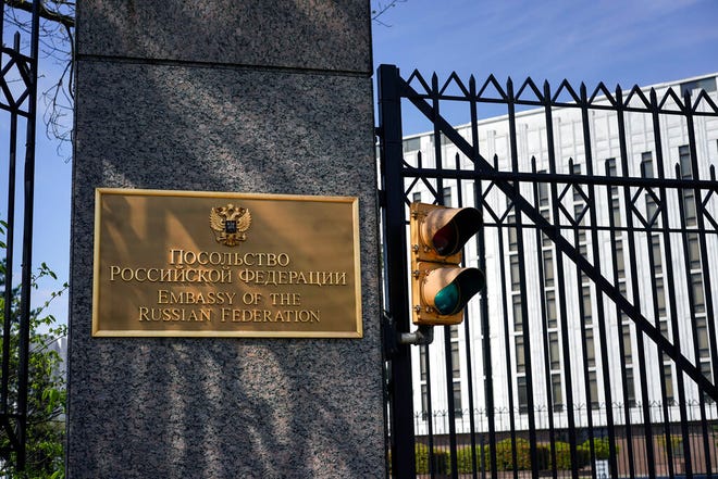 The entrance gate of the Embassy of the Russian Federation is seen in Washington, Thursday, April 15, 2021. The Biden administration has rolled out a sweeping set of sanctions on Russia over its election interference, hacking efforts and other malign activity. (AP Photo/Carolyn Kaster)