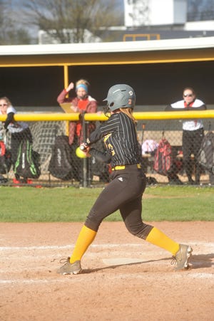 Colonel Crawford's Kaylyn Risner swings at a pitch.