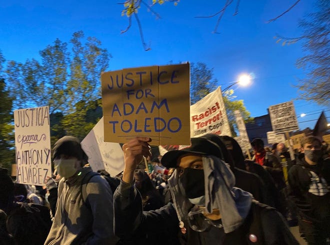 Protests in Chicago demand police reforms Friday in a march through streets and a city park. Adam Toledo, 13, was shot and killed by police in a case that has sparked public outcry.