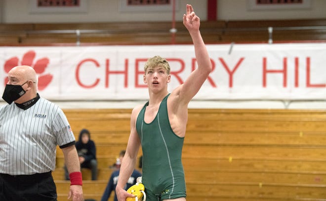 Clearview’s Ty Whalen raises his arm after defeating Southern Regional’s Matt Breilmeier, 15-0, during the 132-pound final bout of the South Region wrestling tournament held at Cherry Hill East High School on Saturday, April 17, 2021. 