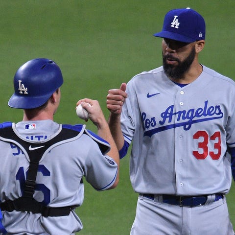 Dodgers pitcher David Price, right, celebrates wit