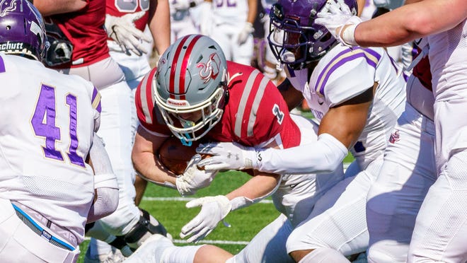 Rose-Hulman running back Shane Welshans dives in for a touchdown in the Fighting Engineers' 52-6 win over Defiance on March 6, 2021 in Terre Haute, Indiana.
