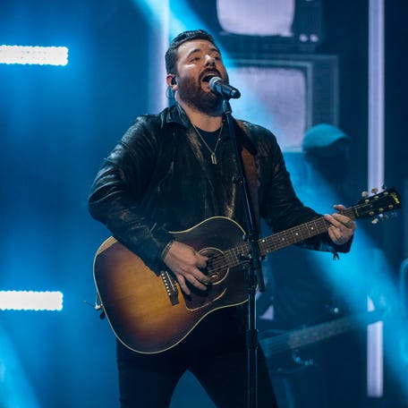 Chris Young sings with and Kane Brown at the Ryman Auditorium during filming for the 56th Academy of Country Music Awards on Friday, April 16, 2021 in Nashville, Tenn.