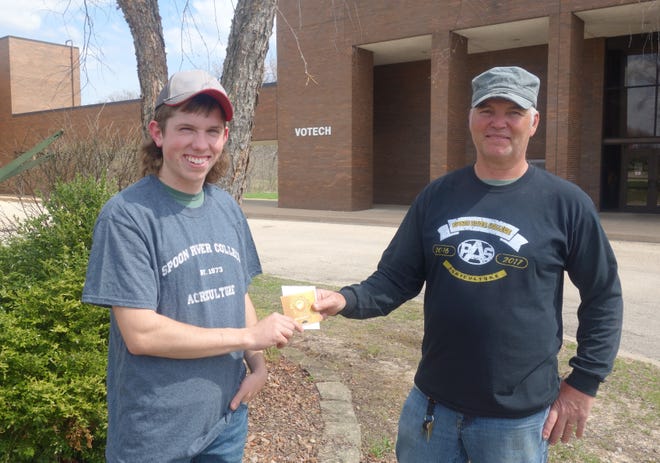 Jacob Miller, student at Spoon River College, is pictured with Jeff Bash, Agricultural Marketing Class Instructor, at Spoon River College.