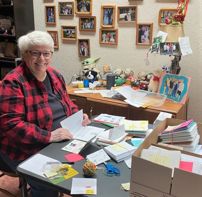 The Bremerton School District is using volunteers like Kathy Cates for its Kindness Project, designed to encourage students and staff with personalized letters and cards.