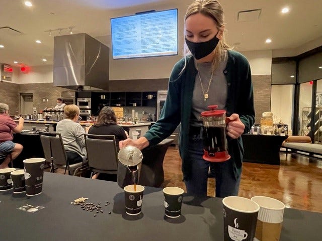 A seminar on coffee from history to brewing to taste will be presented by master coffee roaster Ulli Winckler, president of Rebel Coffee roastery in Cape Coral and a consultant at the Luminary Hotel in downtown Fort Myers, on May 15, part of a regular series of seminars Winckler will hold there. Above, Dean Street Coffee barista Brooke Vance helps pour coffee for seminar attendees to taste