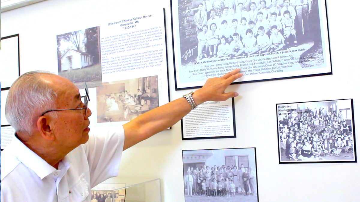 Charles Chiu in the documentary "Far East Deep South" learns about the impact of Jim Crow laws on the Chinese community at the Mississippi Delta Chinese Heritage Museum in Cleveland, MS.
