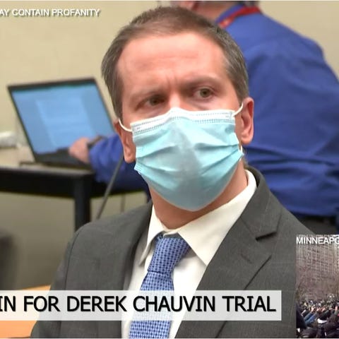 Derek Chauvin listens as a verdict is read during 