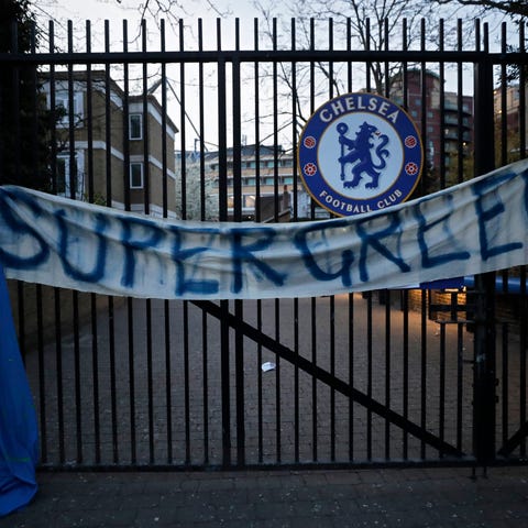 A banner hangs from one of the gates of Stamford B