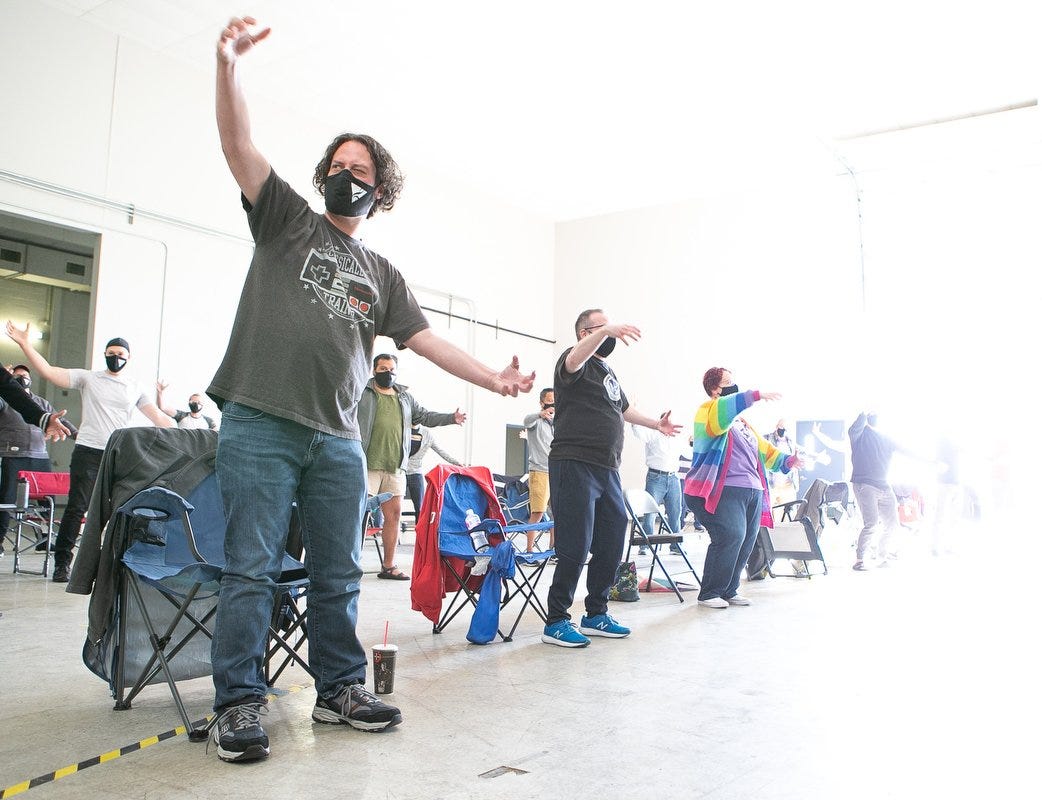 Members of the Columbus Gay Men's Chorus rehearse dance moves to 1993 hit "What's Up" by 4 Non Blondes in preparation for their first performance of the season.