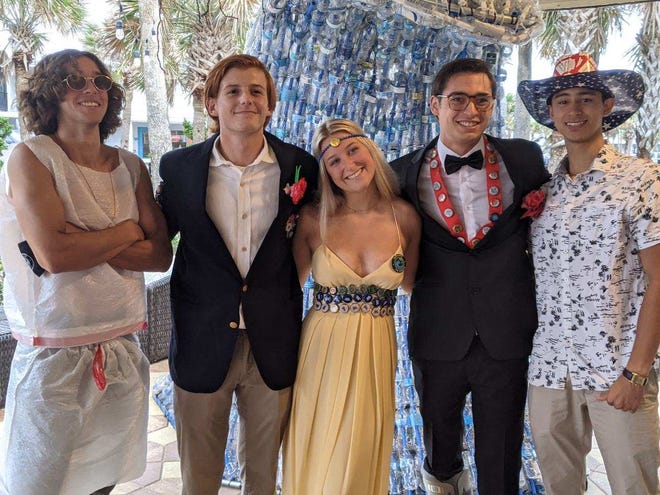 Bottle caps, garbage bags, old newspapers and other discarded items became the hottest fashion items during the inaugural Trashy Prom last weekend.