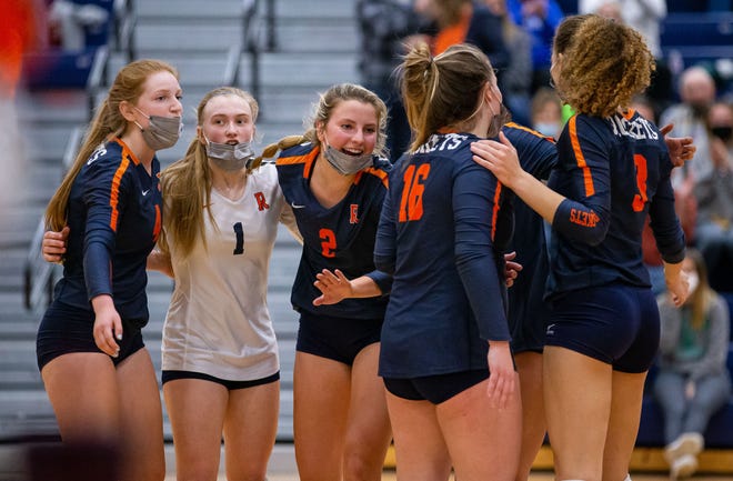 Rochester's Grace Petty (2) and the Rockets celebrate a point against Glenwood in the semifinals of the CS8 Volleyball Tournament at the Rochester Athletic Complex in Rochester, Ill., Tuesday, April 20, 2021. [Justin L. Fowler/The State Journal-Register] 