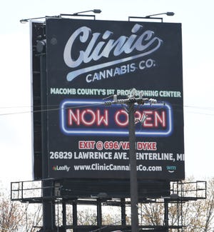 A marijuana billboard for Clinic Cannabis on the I-696 East service drive in Ferndale would be banned under legislation proposed by a bipartisan duo of Michigan lawmakers.