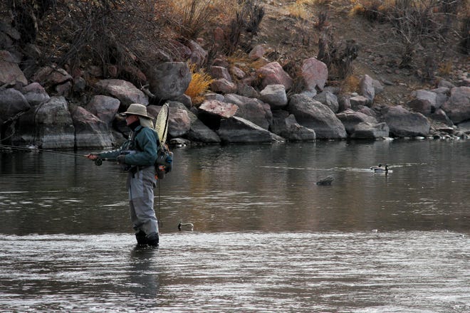 Fishermen take to the headwaters of the Arkansas River in Lake Pueblo State Park. Photos taken January 17.