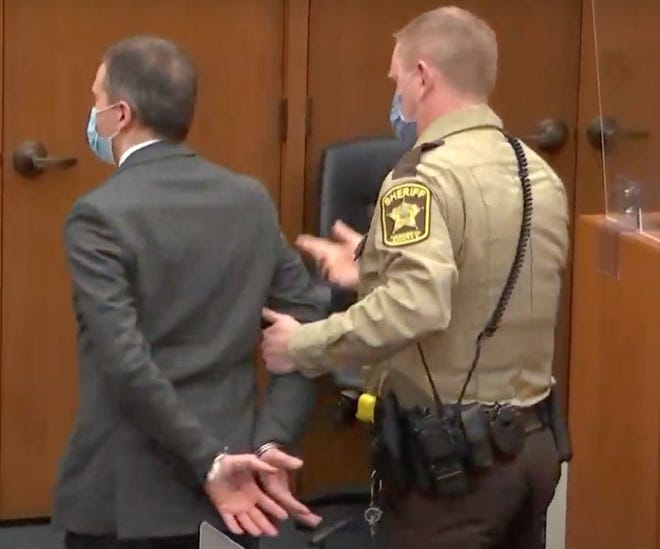 Derek Chauvin is placed in custody after his guilty verdict on all charges in an image from Court TV, is read on Tuesday, April 20, 2021, in the trial of Chauvin, in the May 25, 2020, death of George Floyd at the Hennepin County Courthouse in Minneapolis, Minn. (Court TV/Pool/TNS)