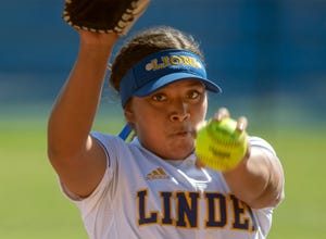 Linden's Hannah Ortega winds up to deliver a pitch during a varsity softball game against Stagg in Linden.