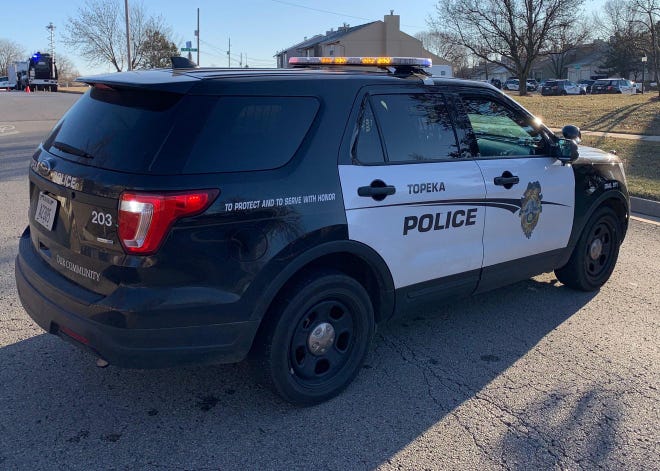 Topeka police arrested a man early Friday in connection with the stabbing of another man.