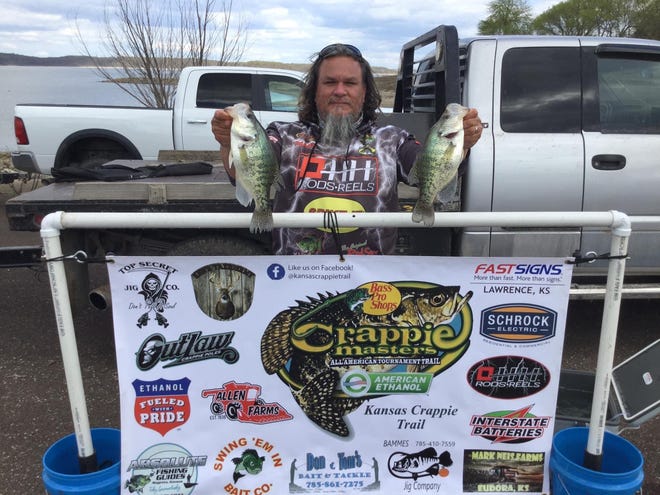 Frank Haidusek, of North Newton, holds up a pair of crappie he caught to help give him the Kansas Crappie Trail win last Sunday on Perry Reservoir.